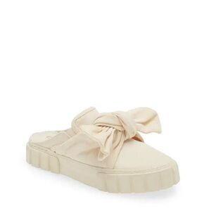 73. Farm Rio $150 Mule Sneaker in off white